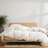 image:imageBrooklinen All Season Luxury Down Comforter 100 Natural Canadian Duck Down Duvet Insert  700 Fill Power 100 Cotton Shell Baffle Box Construction KingCali King Size Comforter  Allseason warmth from natural down in a 100 cotton shell bafflebox build stays fluffy amp even hotelquality comfortUltra Warm White